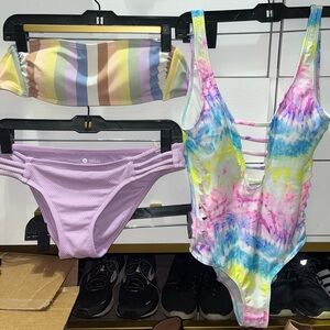 Strapless swim top and purple bottoms. Fun Tie dye one piece.
